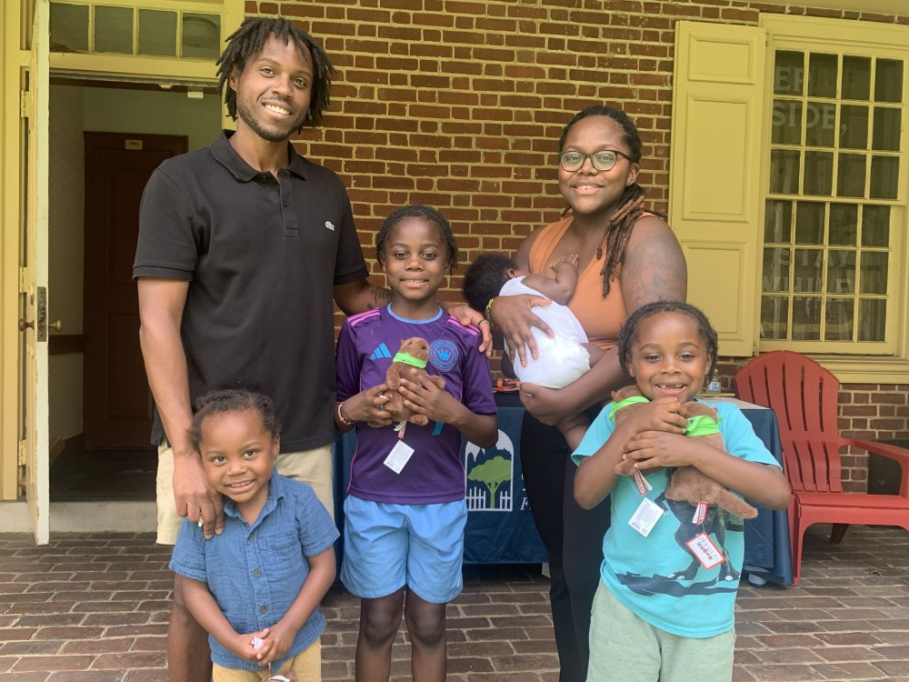 Family with Stamp Rally Prizes July 2026